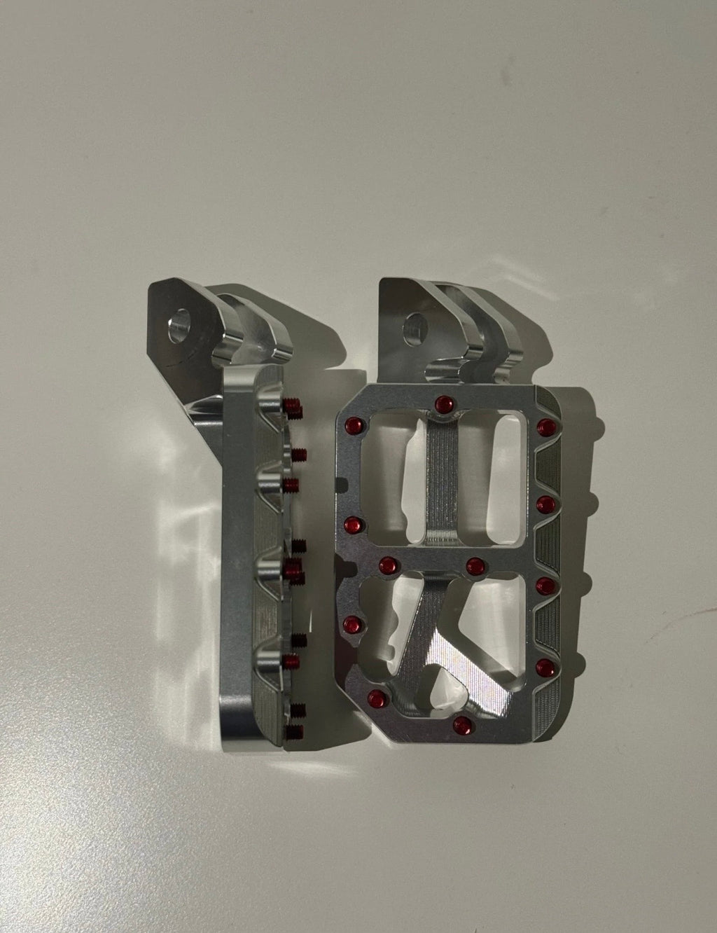 Silver foot pegs (fits all bikes)